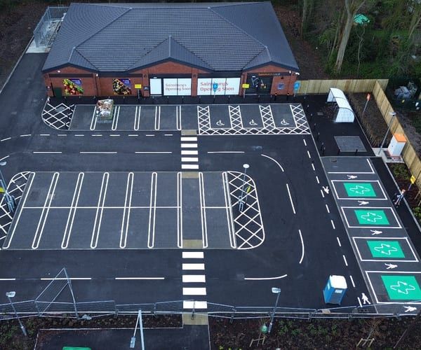 A completed AB Group retail unit and its new car park, seen from the air.