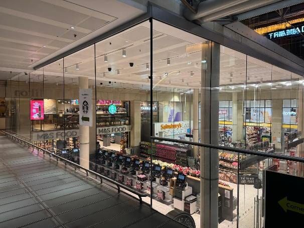 The glazed shopfront of the finished M&S Food outlet at Paddington station.