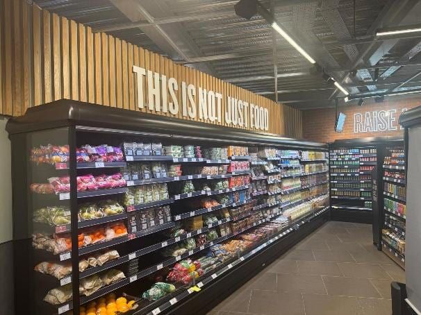 A completed grocery aisle inside the outlet.