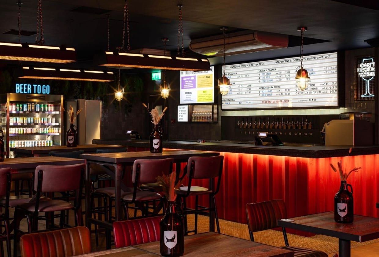 A warm, considered bar interior fitted out by AB Group.